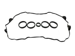 A black valve cover gasket kit for a Nissan S13 SR20DET engine
